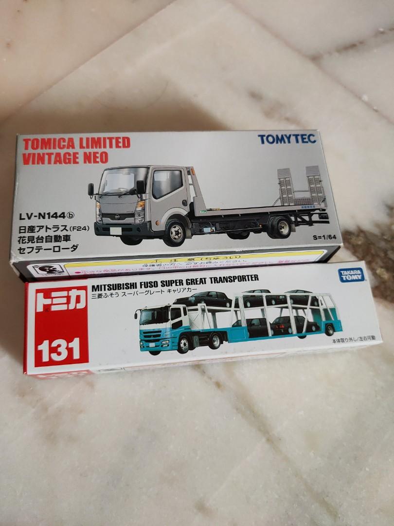 Assorted (Category: Vehicle & Diecast Models) located in Singapore. Submitted by hao (Listing ID 274690802, Image 1). Description: both opened once. #lvn144 #vintage # fuso #transporter #131.