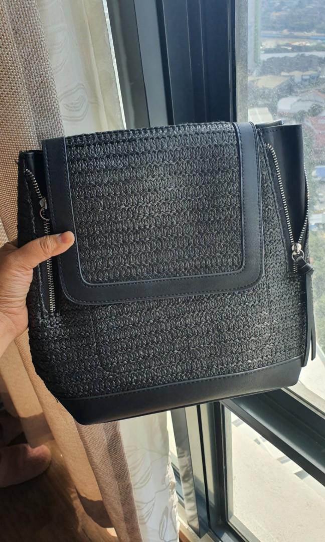 Black Stradivarius Straw Backpack (Category: Backpacks) located in Mandaluyong City. Submitted by dlsibal (Listing ID 274666360, Image 1). Description: Barely used small black Stradivarius straw bag (only brought to a trip once) RFS: decluttering.