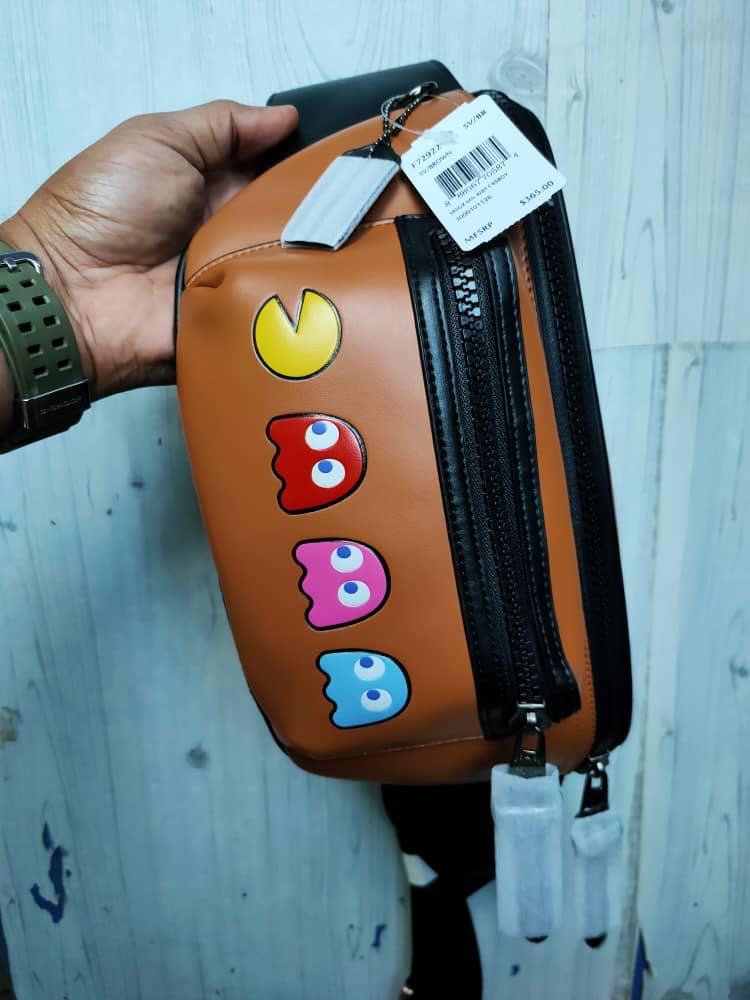 Coach pac deals man backpack