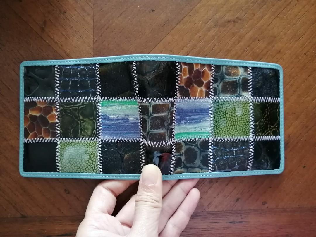 New Leather patchwork wallets (Category: Wallets & Card Holders) located in Singapore. Submitted by pally (Listing ID 274660831, Image 2). Description: Brand new quality leather wallets. Made from a patchwork of decorated leather. Very unique. New with original box, never used. 2 colours available, price is for one wallet..