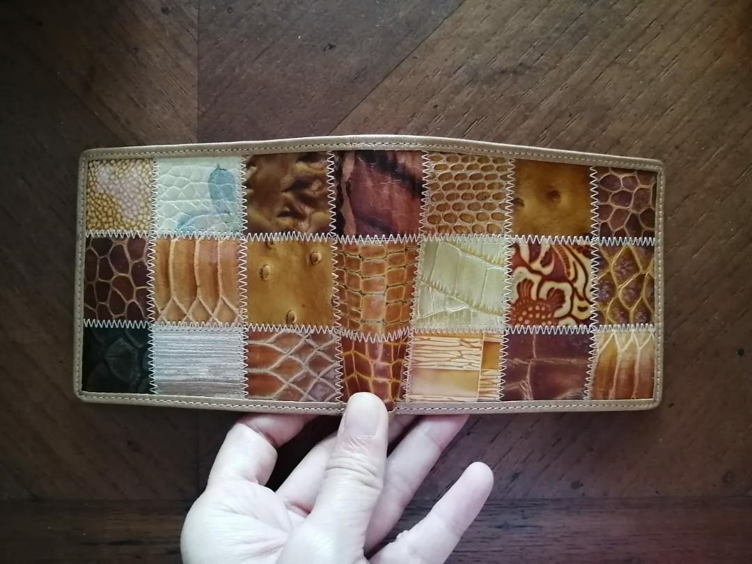 New Leather patchwork wallets (Category: Wallets & Card Holders) located in Singapore. Submitted by pally (Listing ID 274660831, Image 3). Description: Brand new quality leather wallets. Made from a patchwork of decorated leather. Very unique. New with original box, never used. 2 colours available, price is for one wallet..
