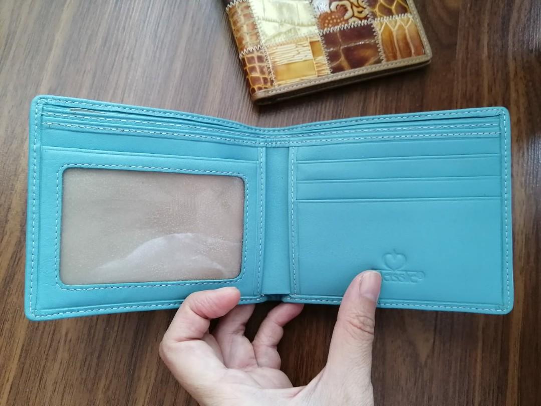 New Leather patchwork wallets (Category: Wallets & Card Holders) located in Singapore. Submitted by pally (Listing ID 274660831, Image 4). Description: Brand new quality leather wallets. Made from a patchwork of decorated leather. Very unique. New with original box, never used. 2 colours available, price is for one wallet..