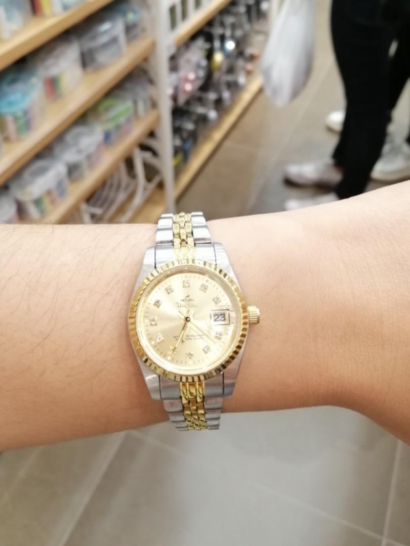 Unisilver couple outlet watch price