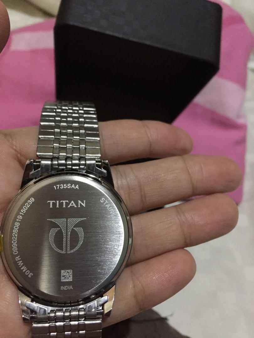 Titan watch 99001saa top