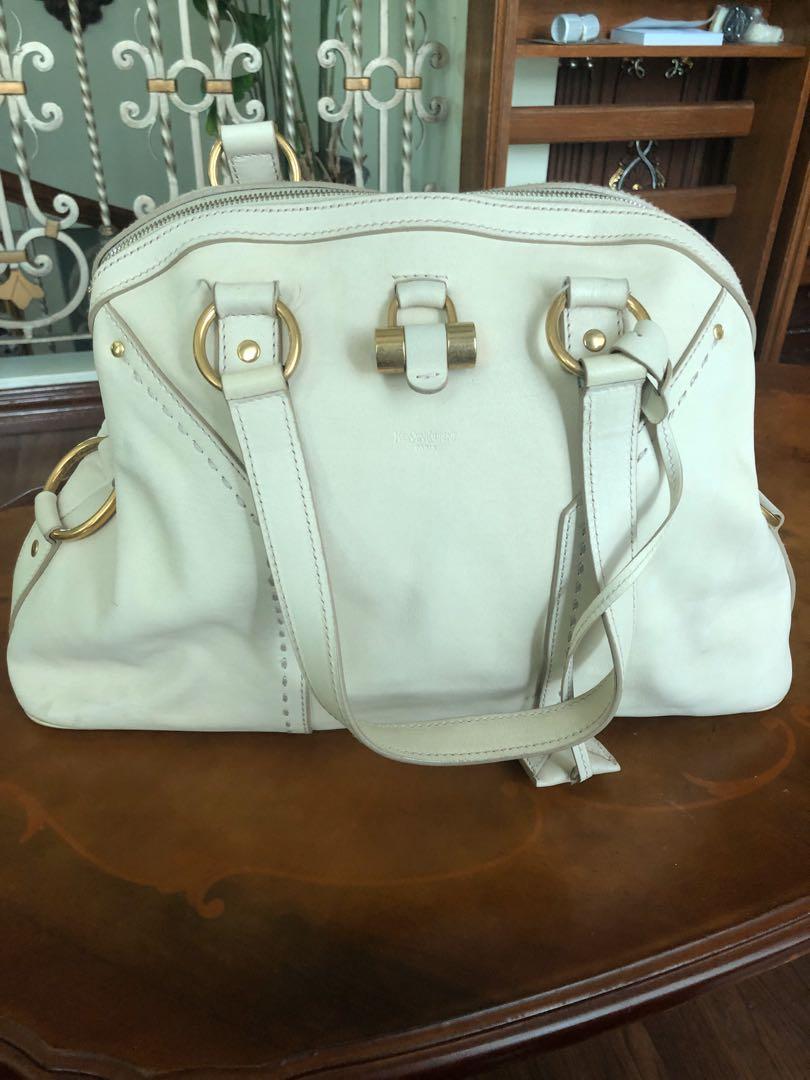 YSL Muse bag vintage (Category: Luxury Bags & Wallets) located in Muntinlupa City. Submitted by rd1007 (Listing ID 274844431, Image 1). Description: Vintage authentic YSL Muse bag in cream calfskin. Needs a bag spa to revive leather but still in good condition. Insides are clean. Price is negotiable. .
