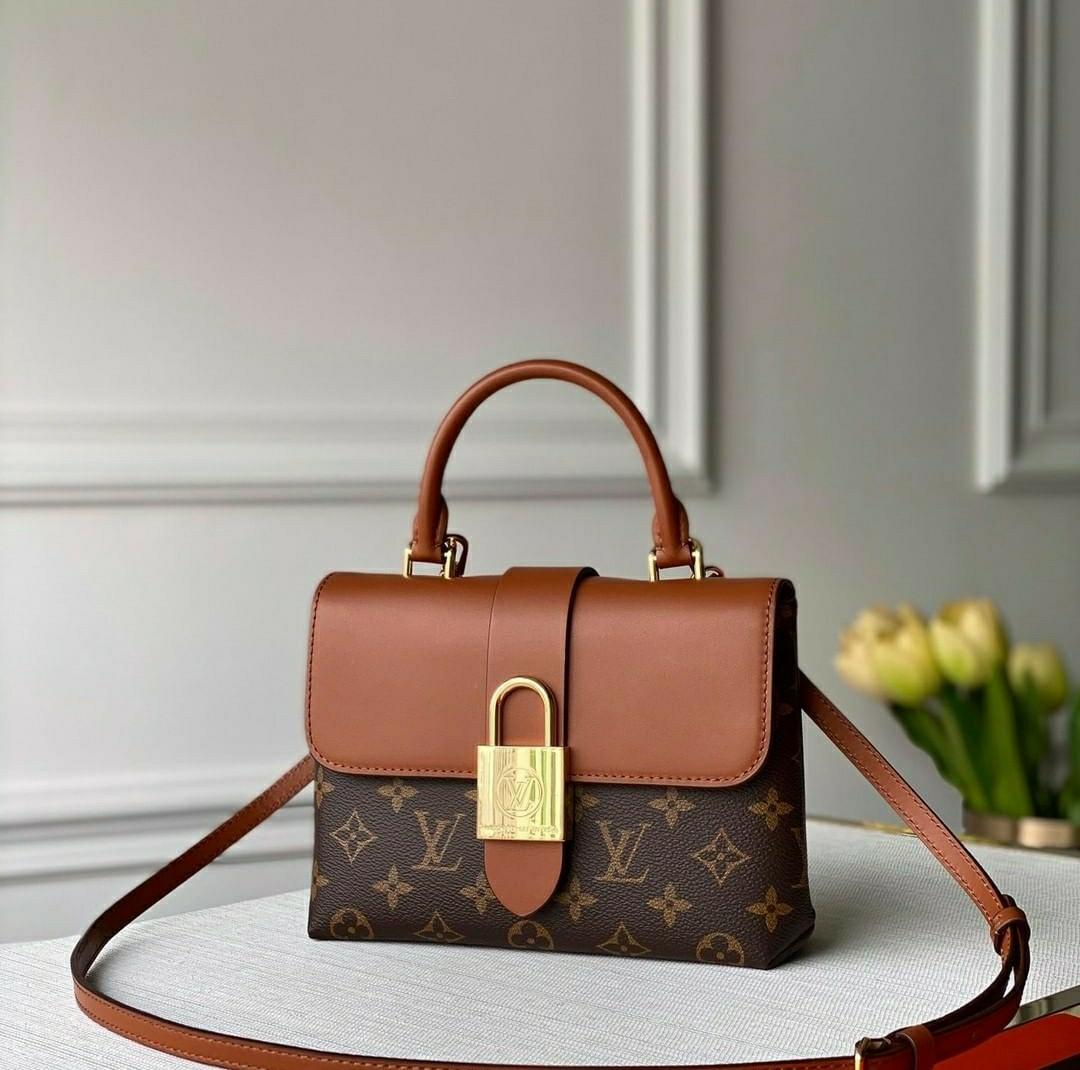 Louis Vuitton LV hand carry, Women's Fashion, Bags & Wallets, Purses &  Pouches on Carousell