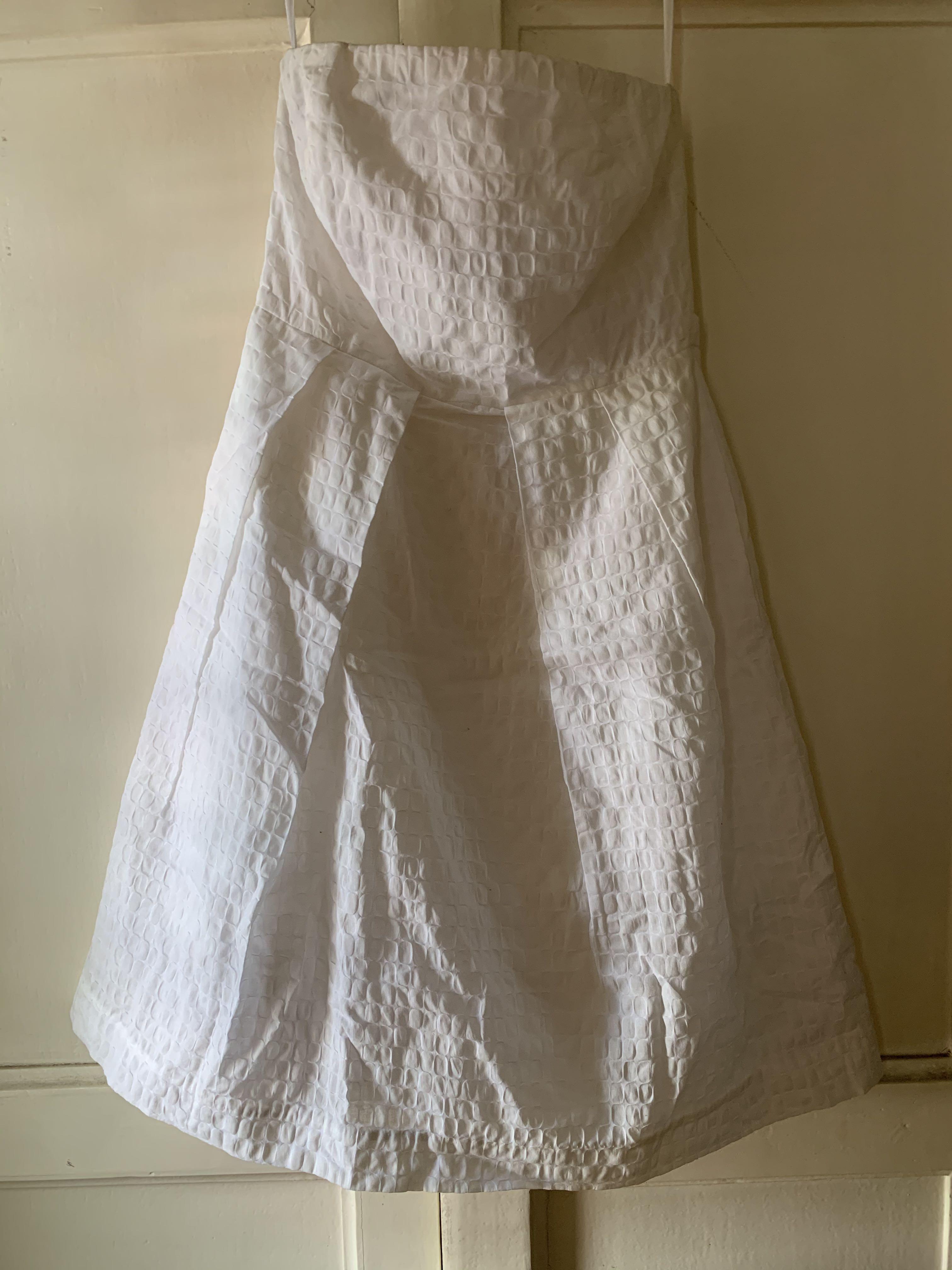 White tube top dress (Category: Dresses) located in Makati City. Submitted by kate78 (Listing ID 274920265, Image 1). Description: White tube top dress. Brand: J. Crew Bought in the US. Only fitted but never worn. Still with tag. Drops above the knee. All details are in the photo. Very very very nice 😍 .