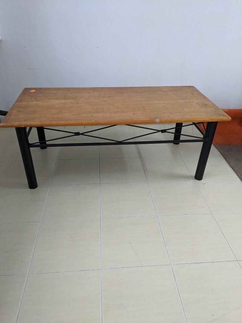 Coffee Table solid wood (Category: Tables & Sets) located in Kuala Lumpur. Submitted by CARLI108 (Listing ID 275090404, Image 1). Description: Sturdy old school coffee table. Solid wood top with black iron legs. Just superficial wood top could use stripping and revarnish. See photos Tall 45cm Deep 61cm Length 122cm.
