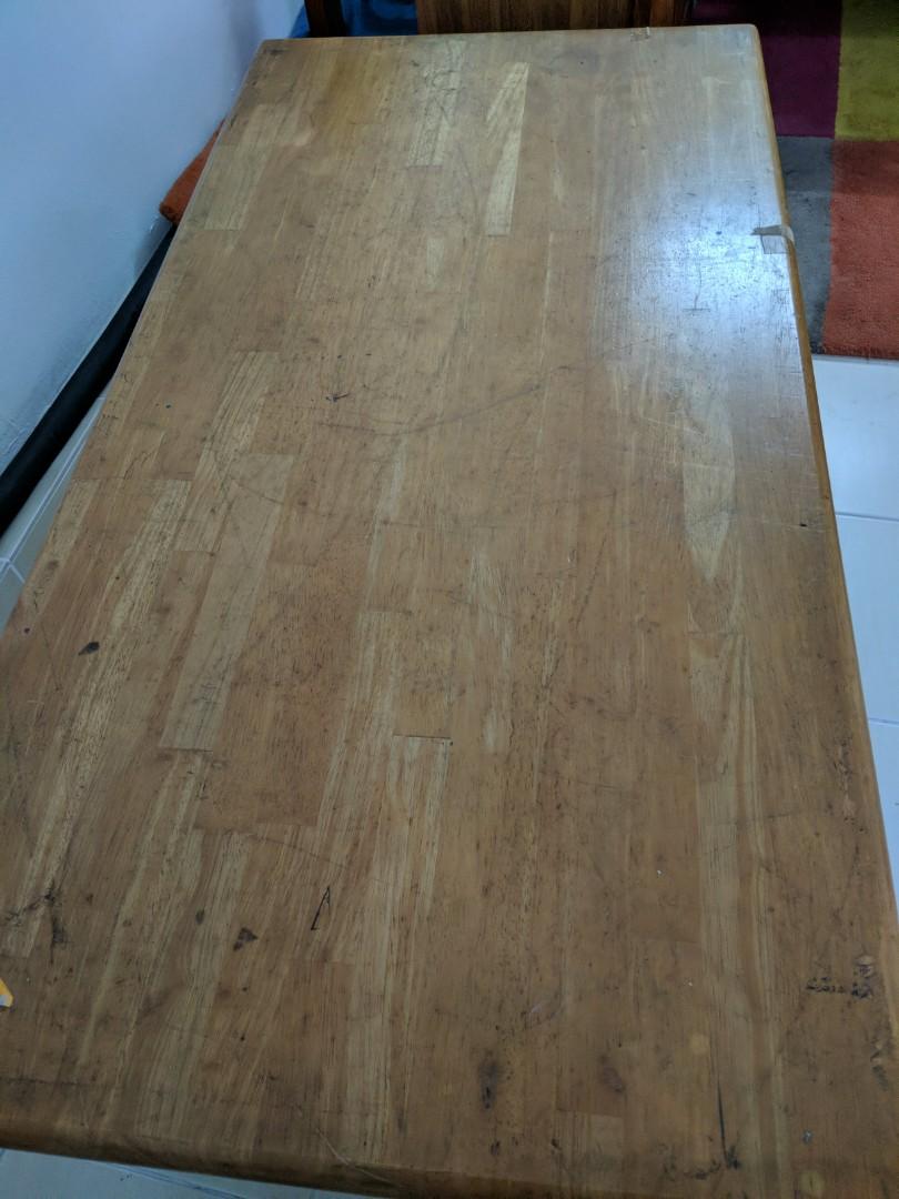 Coffee Table solid wood (Category: Tables & Sets) located in Kuala Lumpur. Submitted by CARLI108 (Listing ID 275090404, Image 3). Description: Sturdy old school coffee table. Solid wood top with black iron legs. Just superficial wood top could use stripping and revarnish. See photos Tall 45cm Deep 61cm Length 122cm.