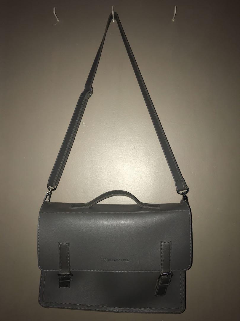 gray leather bag