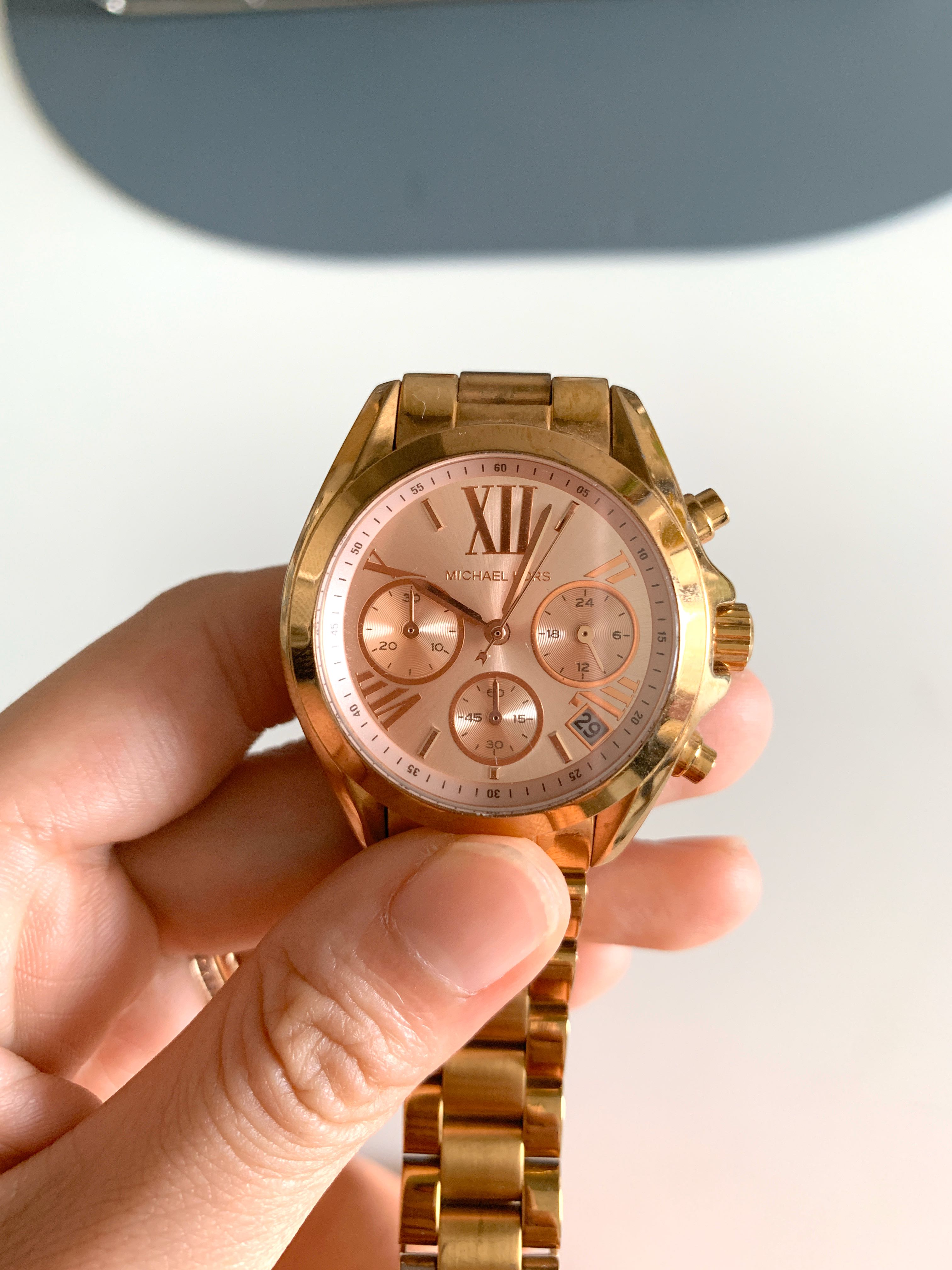 are michael kors watches real gold
