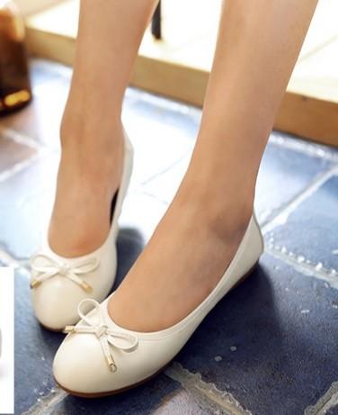 white flats with bow