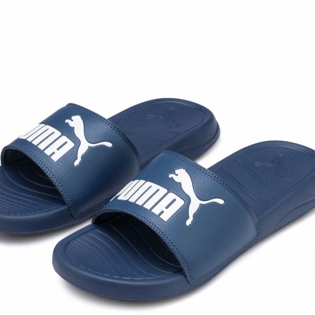 navy blue puma slides