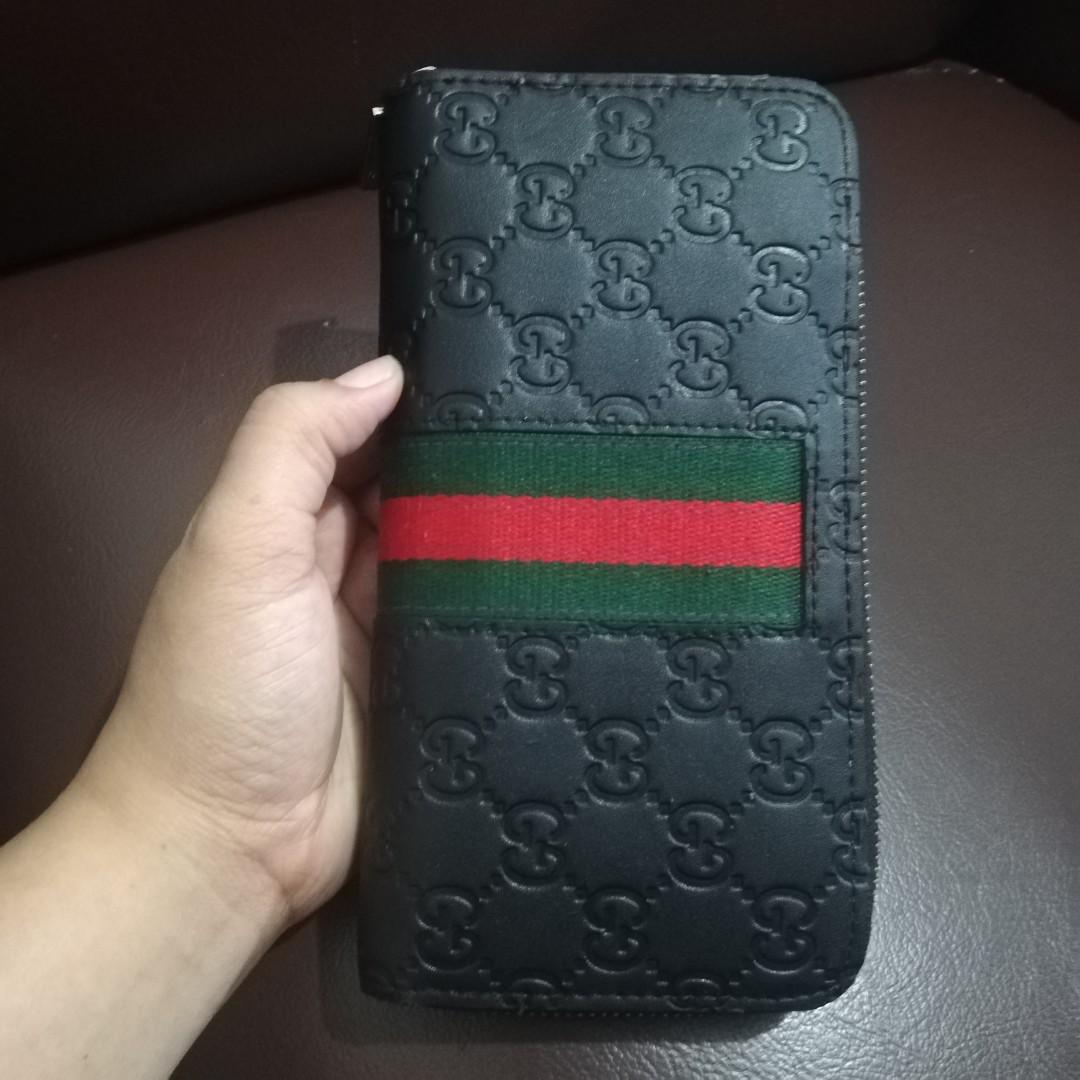 designer long wallet (Category: Luxury Bags & Wallets) located in Manila. Submitted by coolwhale.db3248 (Listing ID 275252035, Image 2). Description: Excellent used condition long wallet no flaw black colour leather.