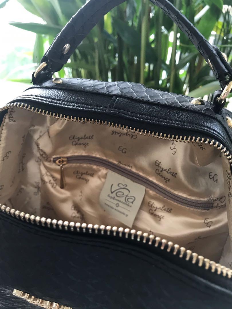 Black lady backpack with top handle