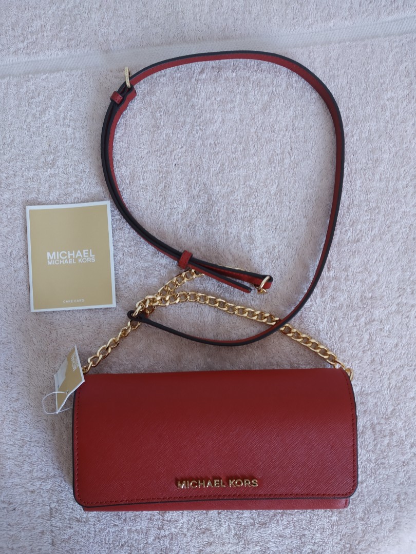 Michael Kors sling wallet bag, Luxury, Bags & Wallets on Carousell