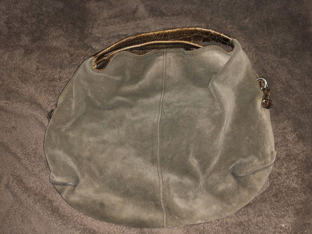 Furla suede bag with strap (Category: Beach Bags) located in San Pedro. Submitted by allenaaa (Listing ID 275398070, Image 1). Description: Furla suede handbag with strap in good condition. Size: Medium Flaw: Stain on interior Rfs: Decluttering.