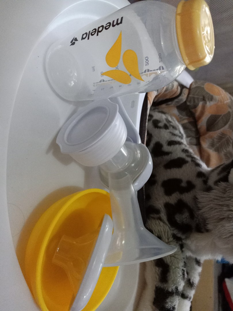Avent Manual Breast Pump With Free Medela Bottle Milk Storage Babies Kids Nursing Feeding On Carousell