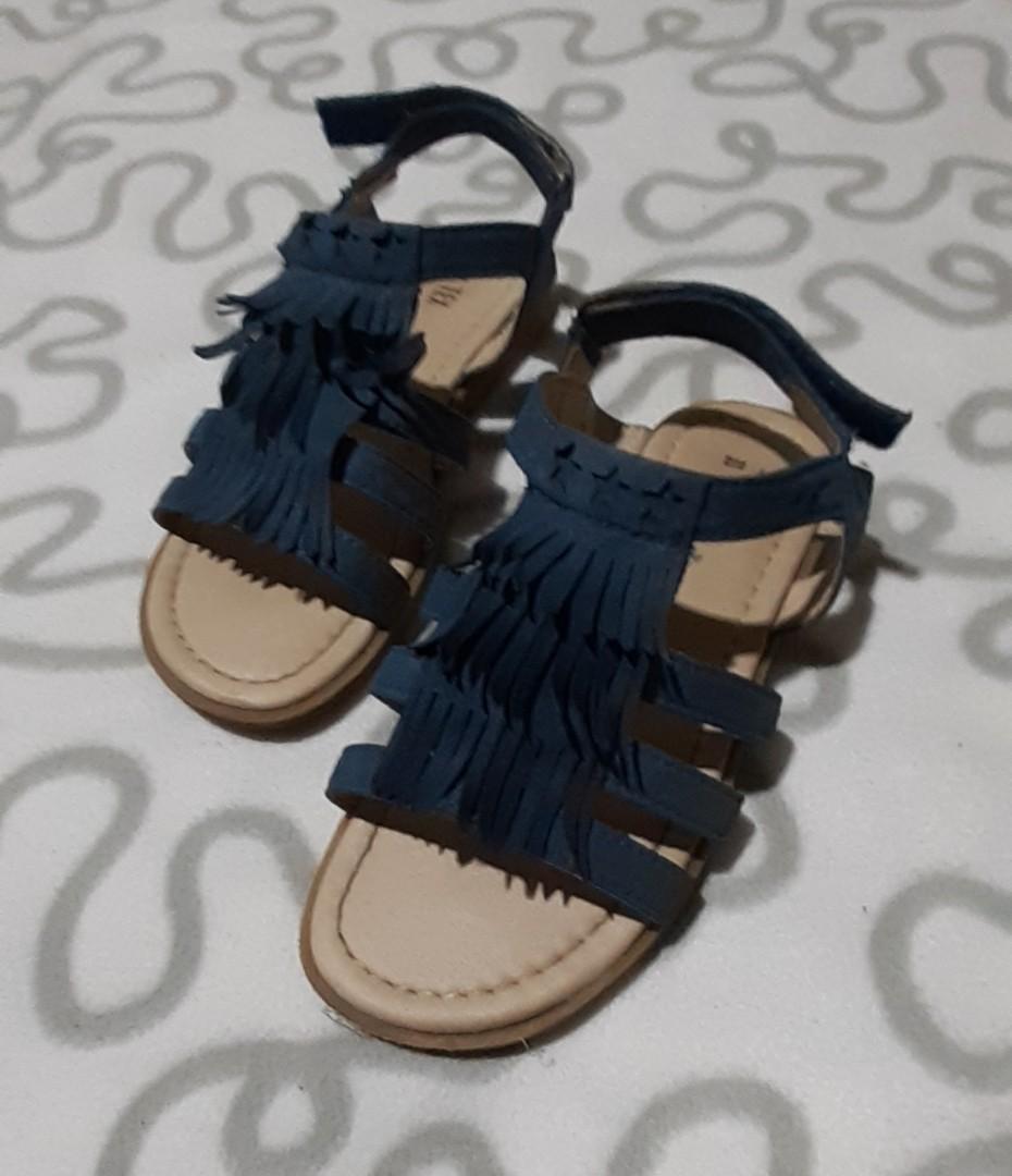 Blue sandals with fringes. (Category: Babies & Kids Fashion) located in Candelaria. Submitted by akerue21 (Listing ID 275477033, Image 1). Description: Never been used. Pasalubong kay daughter pero maliit kaya hindi kasya sa kanya..