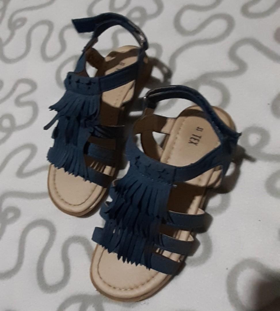 Blue sandals with fringes. (Category: Babies & Kids Fashion) located in Candelaria. Submitted by akerue21 (Listing ID 275477033, Image 2). Description: Never been used. Pasalubong kay daughter pero maliit kaya hindi kasya sa kanya..