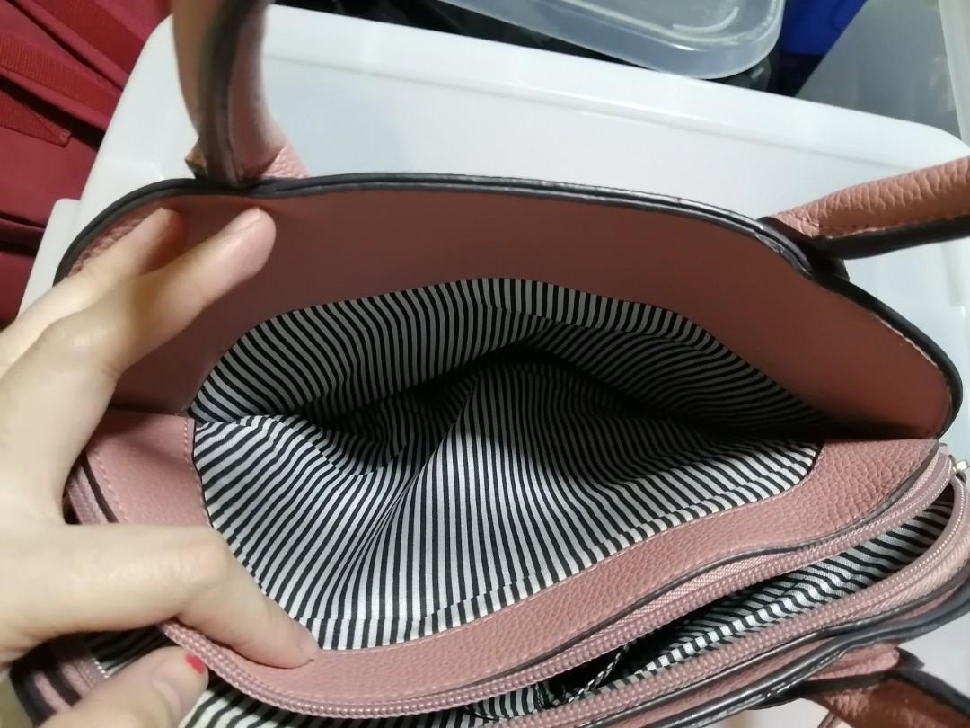 Christian Siriano bag (Category: Purses & Pouches) located in Pasig City. Submitted by trisha_12 (Listing ID 275470315, Image 3). Description: for sale Christian Siriano bag bought at Payless megamall in good condition meetups: ortigas area rfs: declutting.