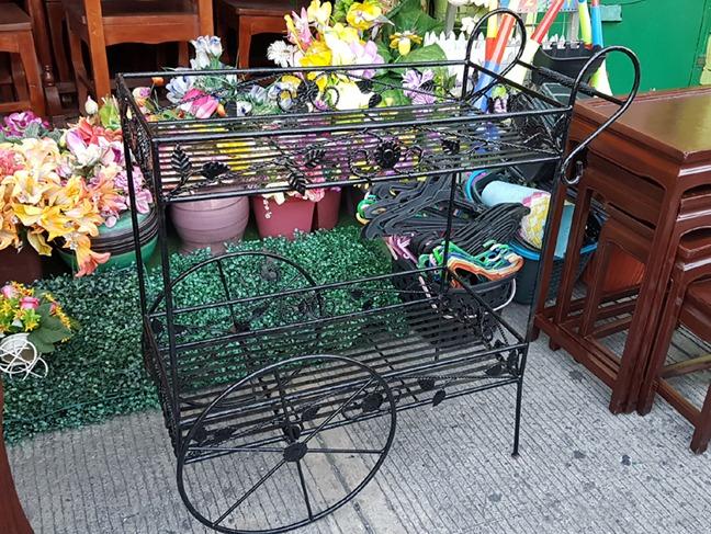 Serving Display Metal Cart (Category: Other Kitchenware & Tableware) located in Manila. Submitted by vivian.vivian3 (Listing ID 275569833, Image 2). Description: Serving DServing Display Metal Cart * With 2 serving layers * Flower accent design details * Size: 32 x 14 x 30.5 inches (Length x Width x Height) * Price is ₱ 4,500 Kindly visit our Facebook Page: Vivian's Collections For inquiries: (02) 8343-7727 / 0920-9453744.