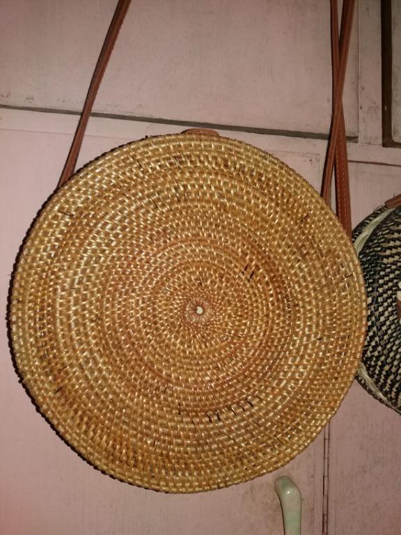 Bali Rattan Bag (Category: Cross-body Bags) located in Manila. Submitted by yeahyeahss (Listing ID 275641450, Image 1). Description: Rattan Bag (Bali) Approximate measurements in inches Diameter – 9 Thickness – 2.5 Payment Method - BPI, Union bank Shipping - Abest (additional 70-80 pesos but still depending on overall weight and buyer's location), Meetups possible around Malabon or Ayala LKG Tower.