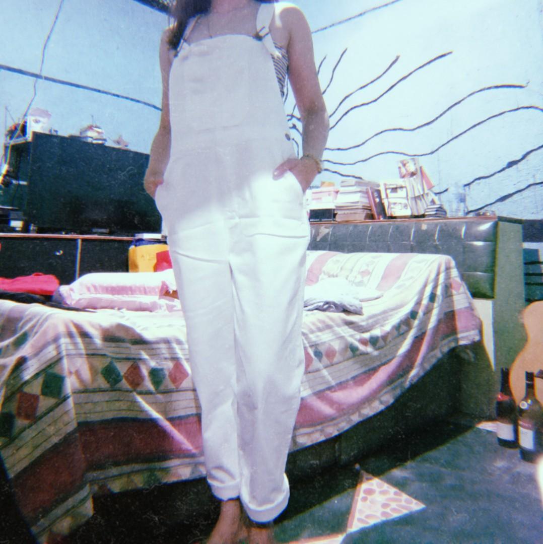 white jumper and jeans