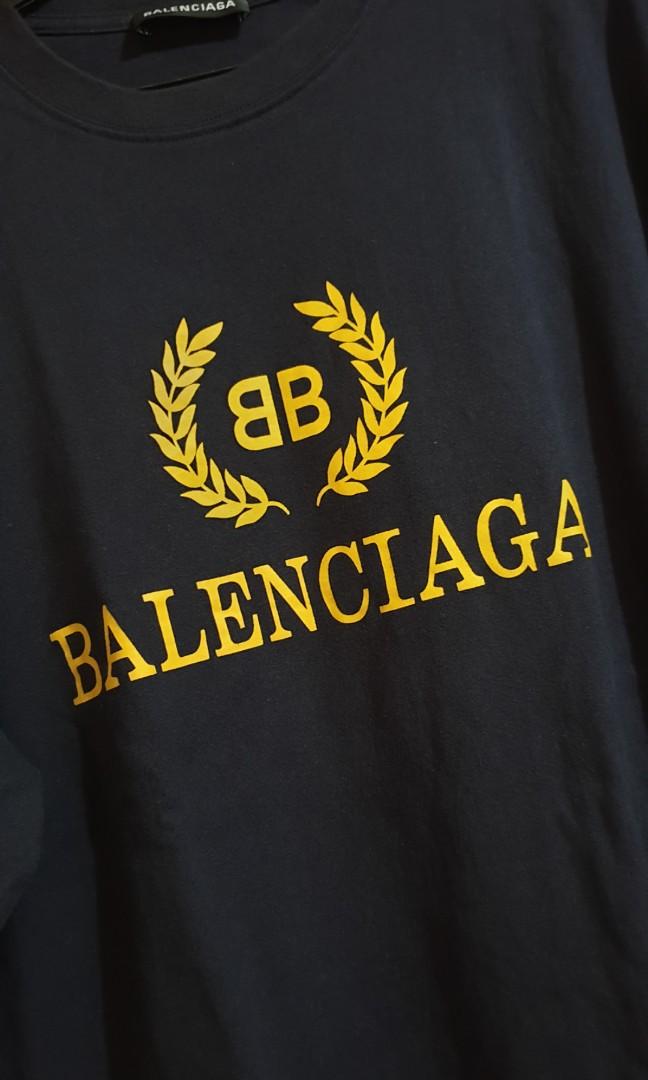 Balenciaga Tshirt Navyblue Yellow Men S Fashion Clothes Tops On Carousell