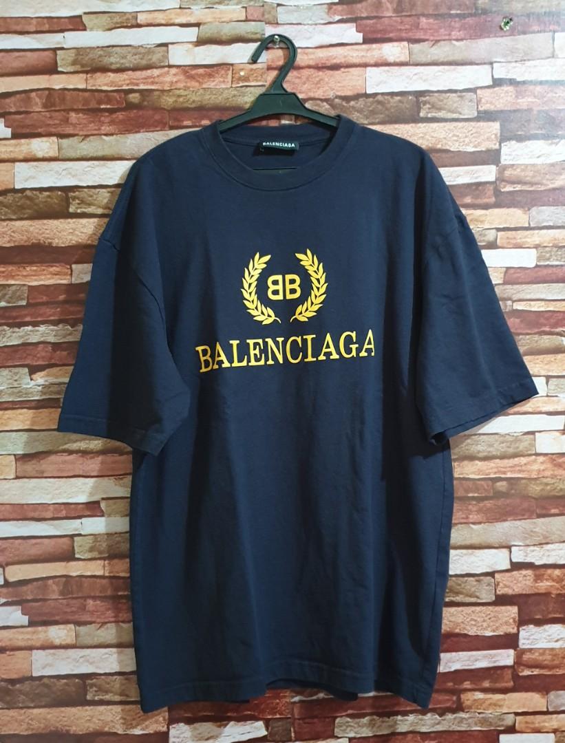 Balenciaga Yellow Interlock Tee Mens Fashion Tops  Sets Tshirts  Polo  Shirts on Carousell