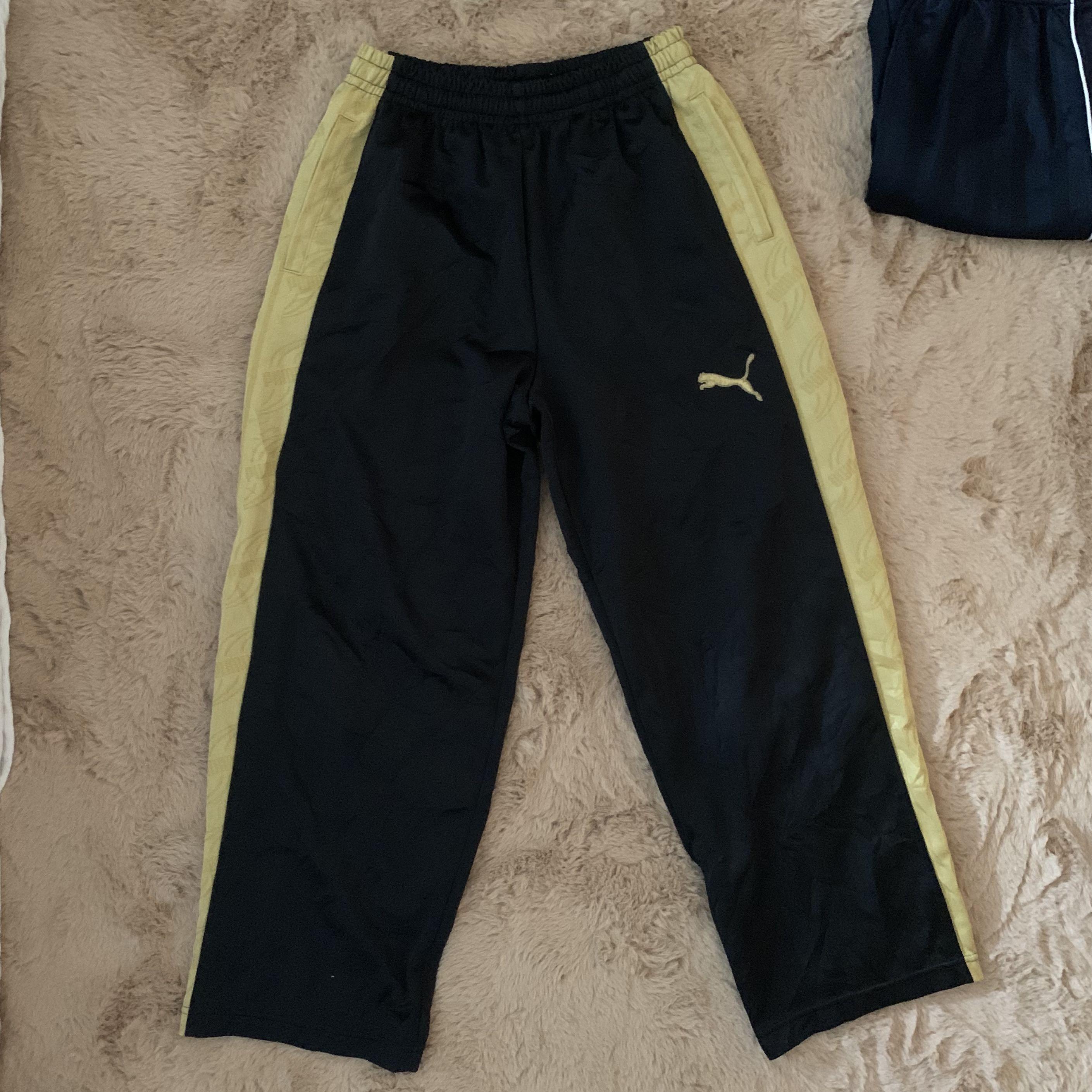 black and gold puma pants