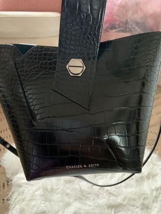 charles and keith wristlet bucket bag