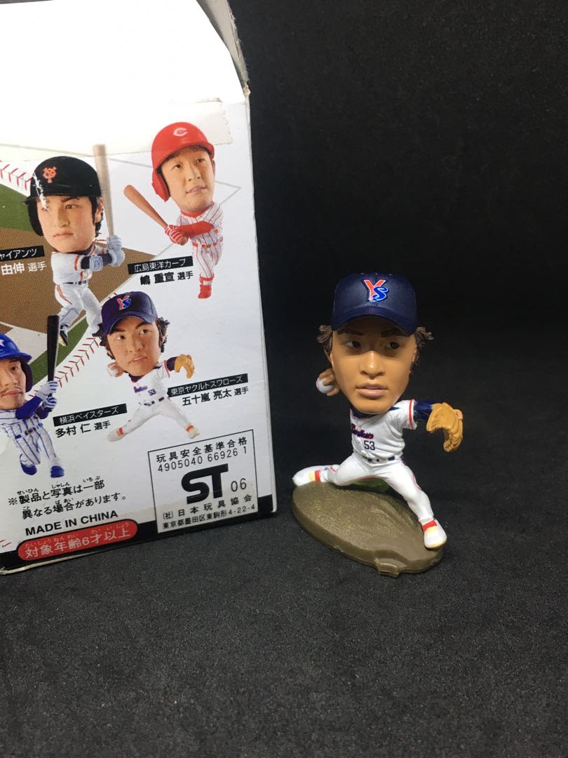 miniature toy baseball players
