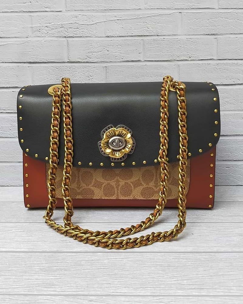 Harga coach parker new arrivals