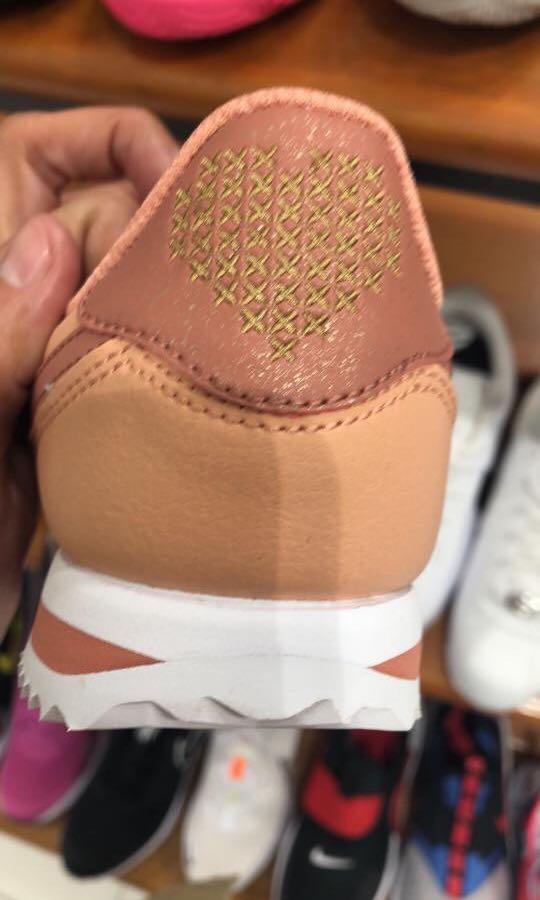 peach nike cortez