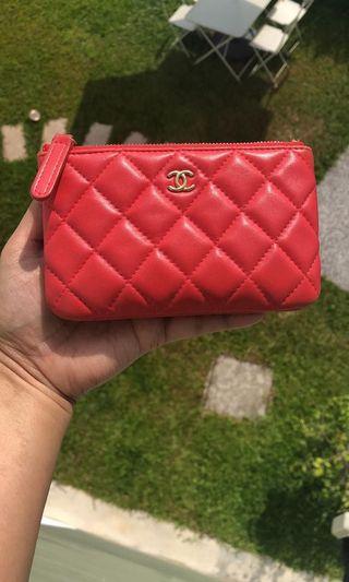 Pre-loved Chanel Mini O-case Pouch