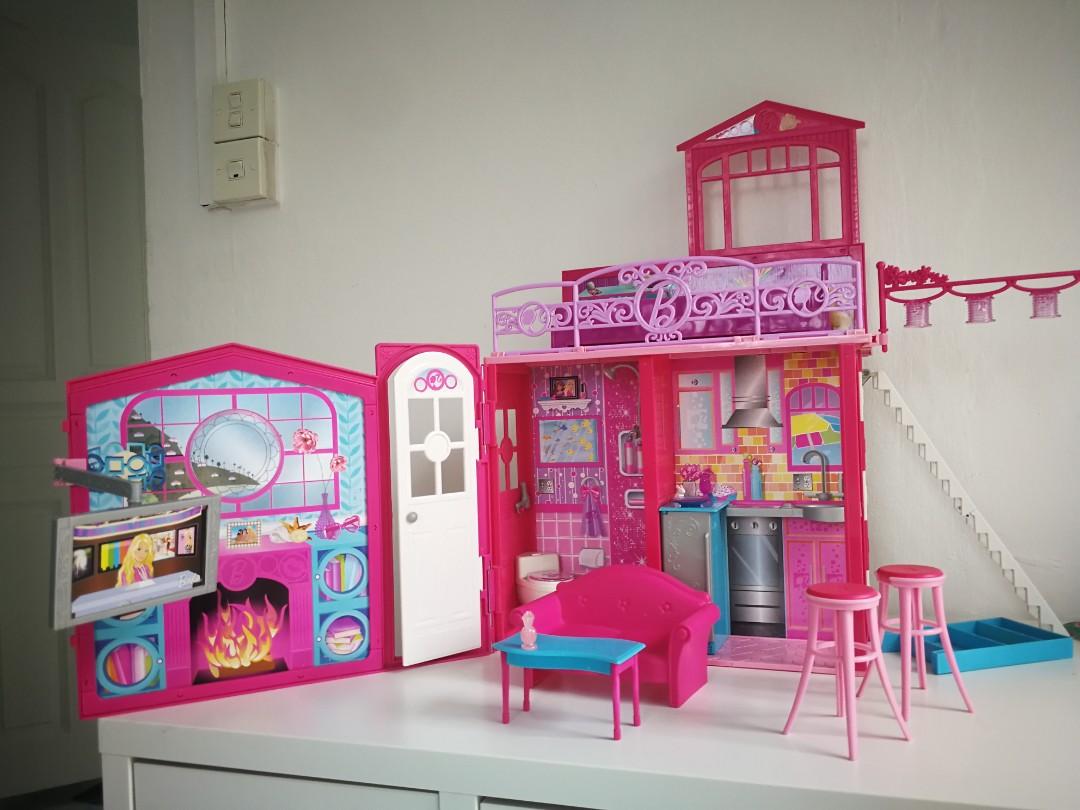 Barbie travel doll hotsell house