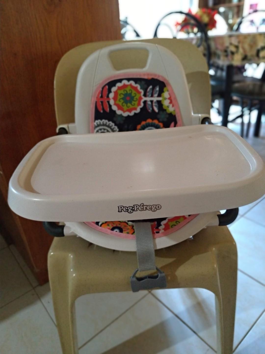 Peg Perego Rialto Booster Seat (Category: Baby High Chairs) located in Taguig. Submitted by cbyegandco. (Listing ID 276720624, Image 3). Description: VGUC The Original Paddings are replaced using a Jujube Padded Changing Pad.
