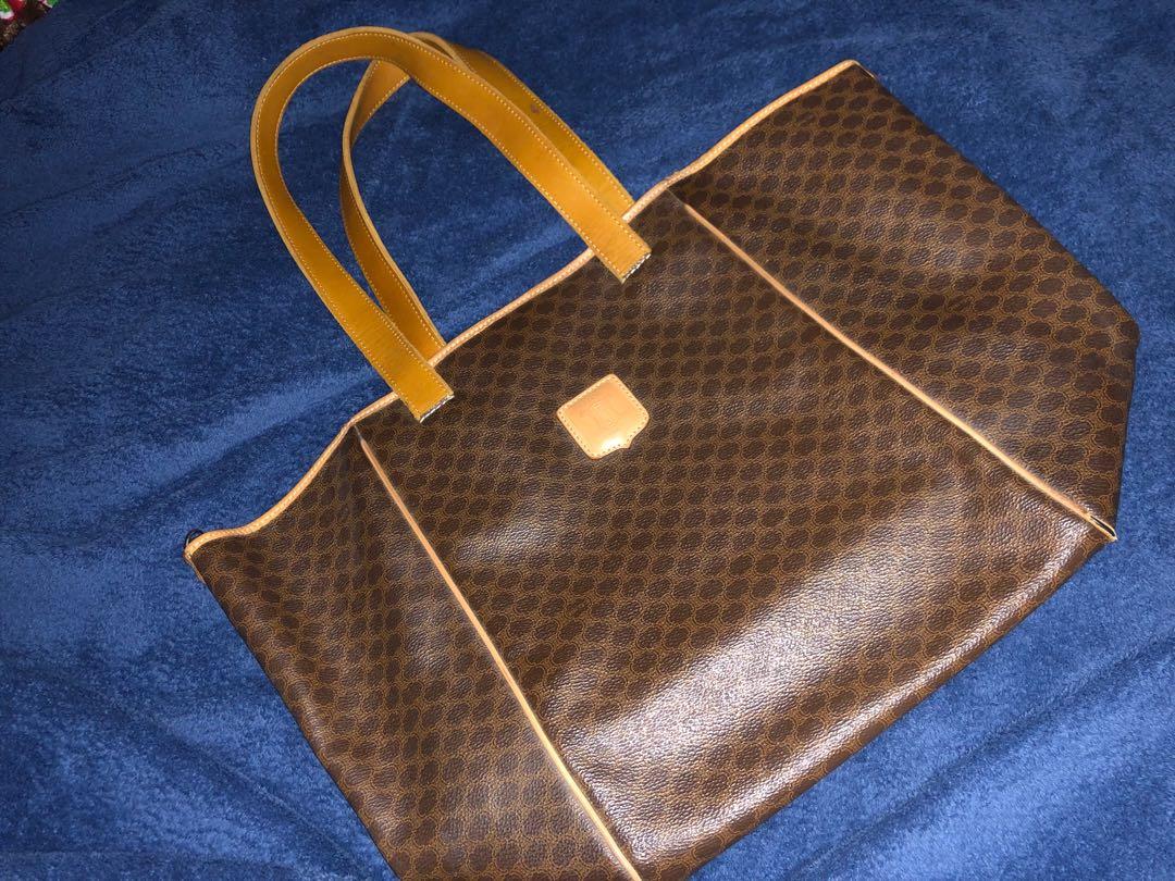 Céline Macadam Tote Bag (Category: Tote Bags) located in San Pedro. Submitted by allenaaa (Listing ID 276931758, Image 1). Description: Céline Macadam Tote Bag in Brown (like LV Neverfull peg) Size: Large Rfs: Decluttering Kindly see pics for flaws. Corners scuffing. Replaced straps. .