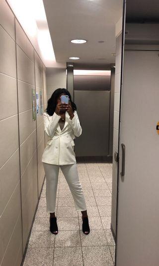 White pant suit