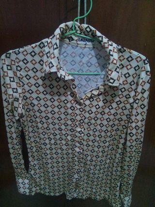 Kemeja motif kotak