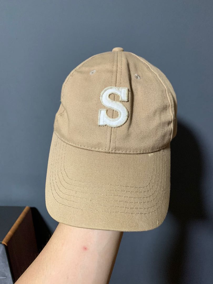 beige champion hat