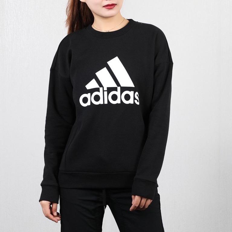 black hoodie with roses on sleeves