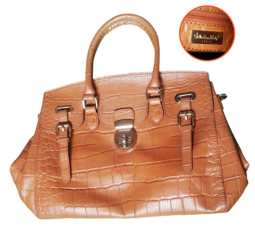 Brown Valentino Rudy leather handbag (Category: Purses & Pouches) located in Cebu City. Submitted by alsnxa (Listing ID 277189723, Image 1). Description: Still in excellent condition from Italian maker Valentino Rudy..
