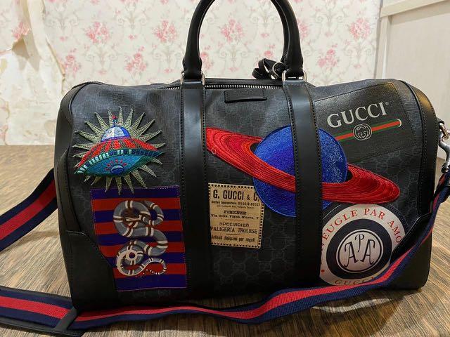 Sold at Auction: GUCCI BLACK CARRY-ON DUFFLE BAG