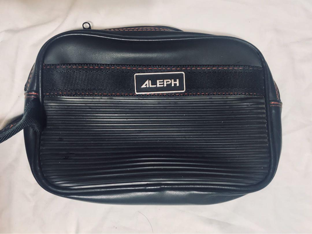 Aleph Mens Pouch bag, (Category: Belt bags, Clutches and Pouches) located in San Pablo. Submitted by elijasam (Listing ID 277771764, Image 1). Description: Authentic preloved Aleph pouch bag.. Small, black w/ lining red YKK zipper No flaws, can pass as new! For Men handbag.. .