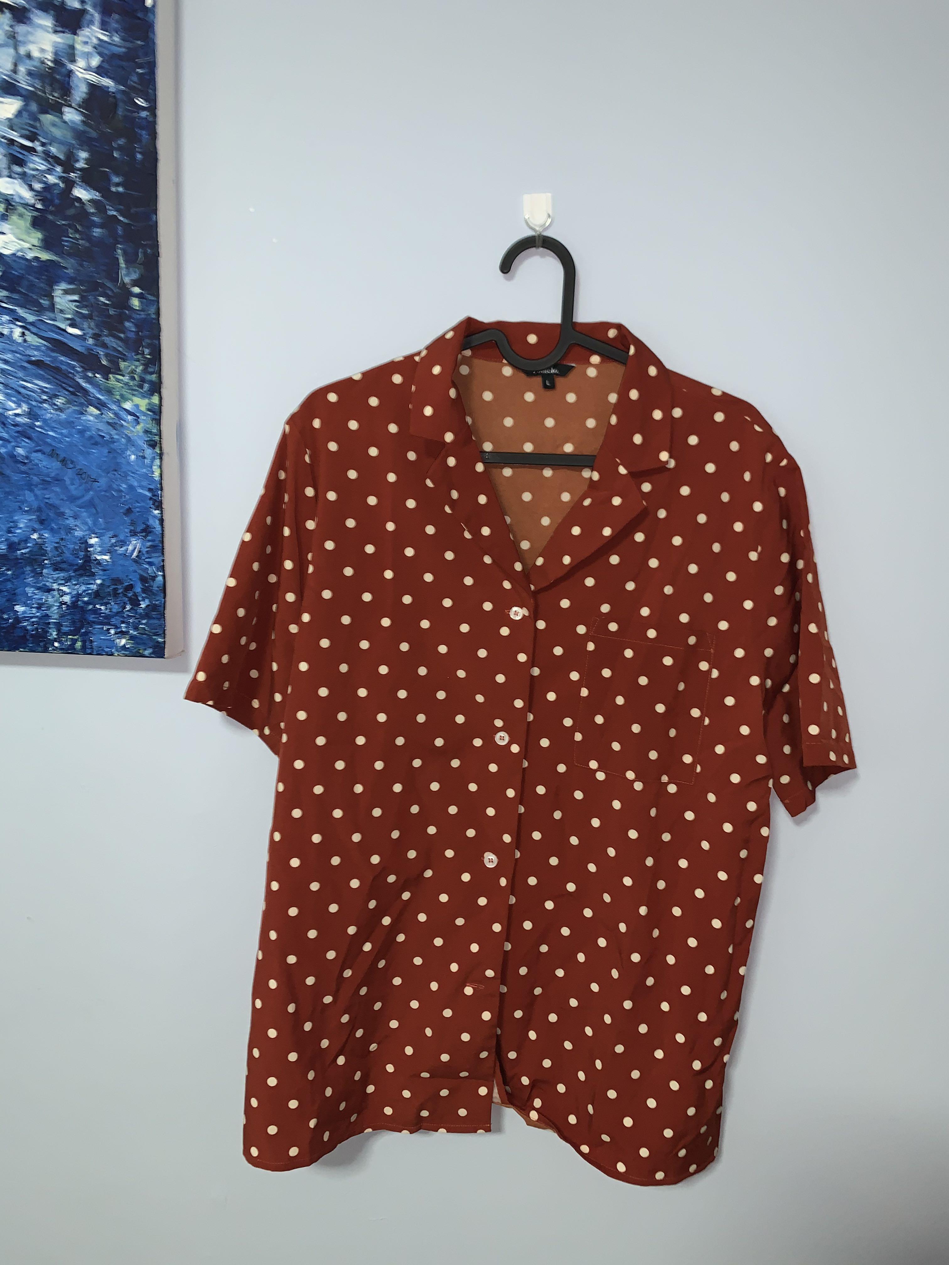 orange polka dot shirt