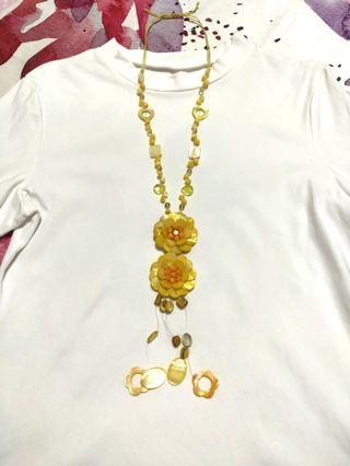 Long necklace with embellishment