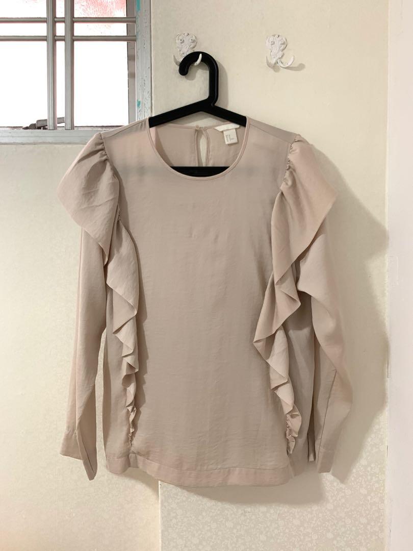 beige ruffle blouse