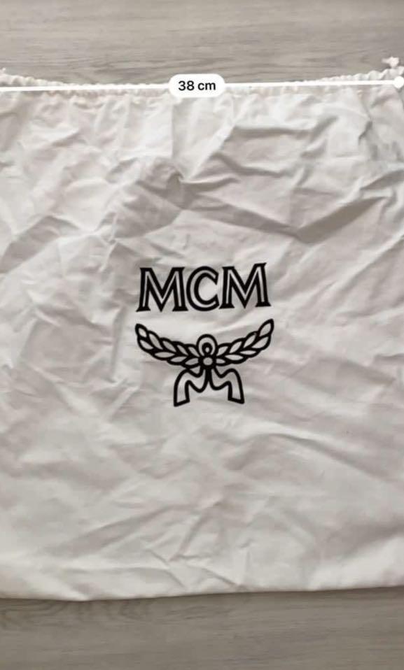 Mcm backpack hotsell dust bag